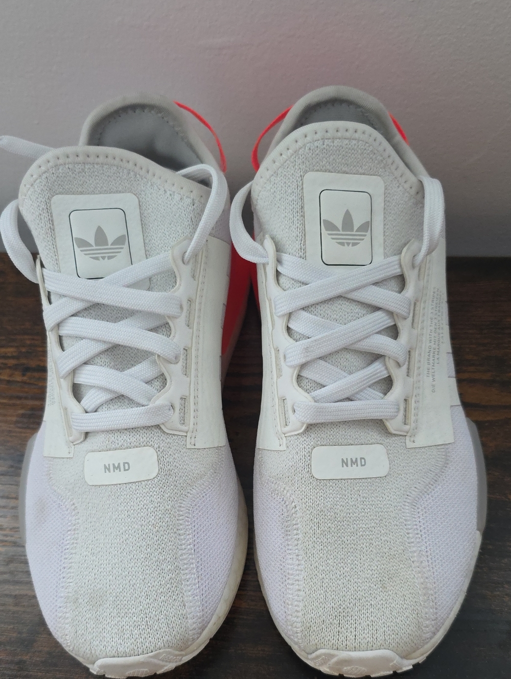 adidas Women’s White NMD Sneakers with Pink Heel Accents